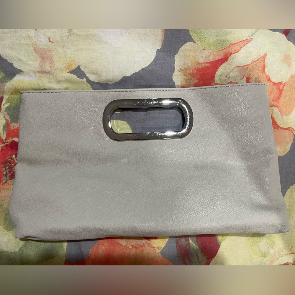 SOLD FREE with purchase! Lightly used gray clutch with detachable silver chain